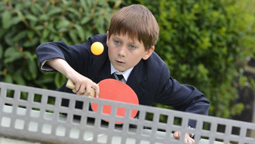 Boy playing pingpong
